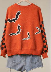 After Dark Checkerboard Sleeve Knit Sweater