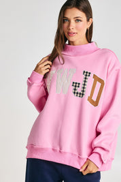 Faith Lettering WWJD Mock Neck Sweatshirt in Baby Pink - product photo 1