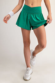Match Day Crossover Flared Active Shorts in Fresh Green, photo 1