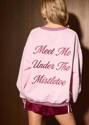 Under the Mistletoe Graphic V-Neck Sweatshirt in Light Pink — product photo 01