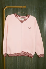 Under the Mistletoe Graphic V-Neck Sweatshirt in Light Pink — product photo 05
